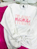 White embroidered sweatshirt with the text 'PRAYING Mama' and a graphic of a mother holding a child.