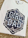 White sweatshirt with 'Girl Dad' graphic on a textured surface